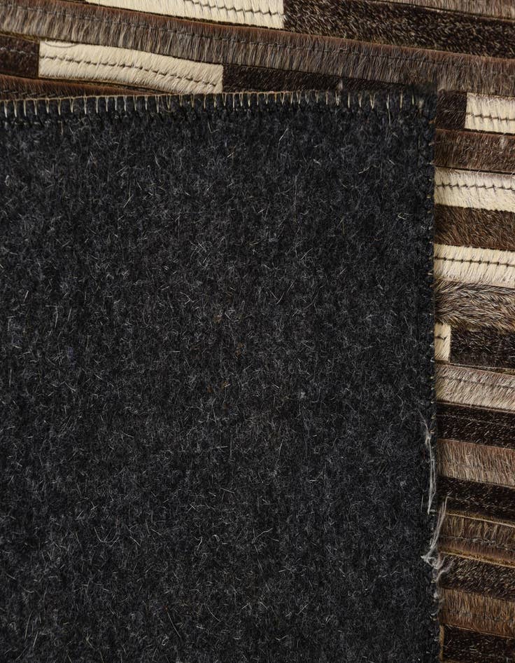 Detail image of  2' 1 x 3' 3 Cowhide Rug