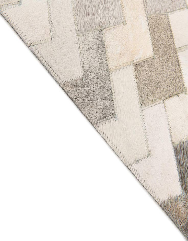 Detail image of  6' x 8' 11 Cowhide Stocks Rug