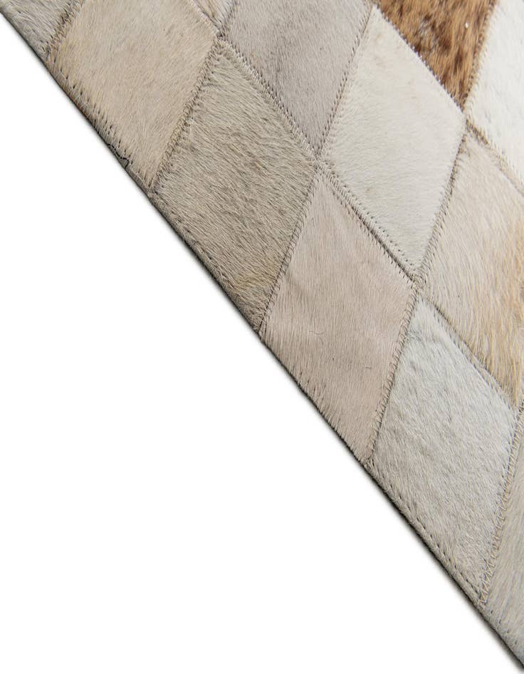 Detail image of  5' x 7' 11 Cowhide Stocks Rug