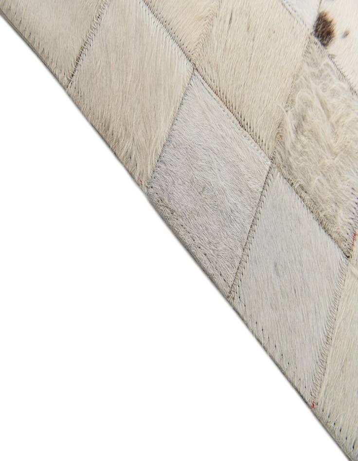 Detail image of  5' x 7' 11 Cowhide Stocks Rug