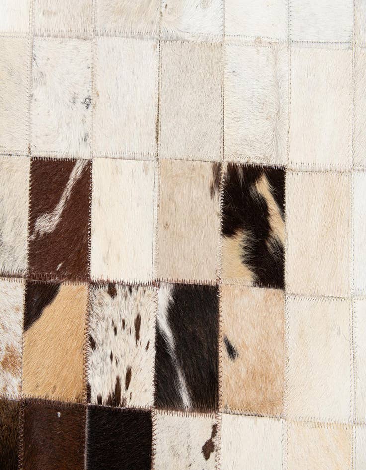Detail image of  5' x 7' 11 Cowhide Stocks Rug