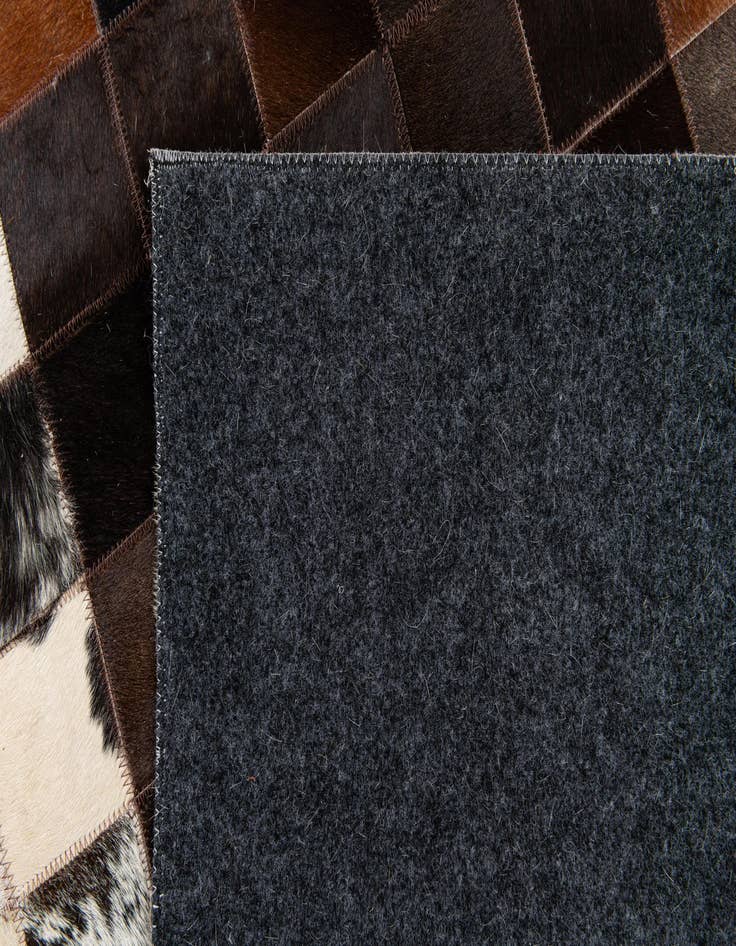 Detail image of  5' x 8' Cowhide Stocks Rug