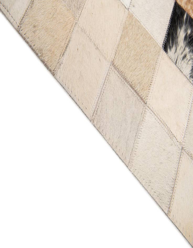 Detail image of  5' x 7' 11 Cowhide Stocks Rug