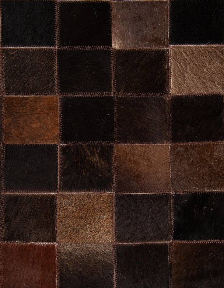 Detail image of  5' x 7' 11 Cowhide Stocks Rug