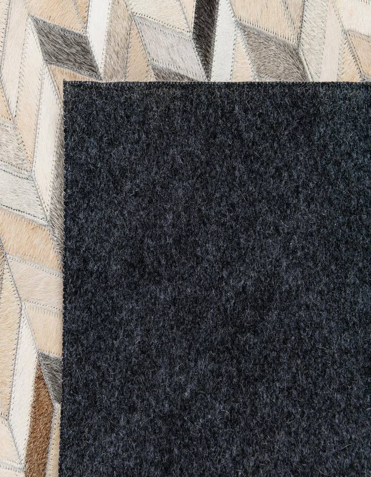 Detail image of  5' 7 x 7' 11 Cowhide Stocks Rug