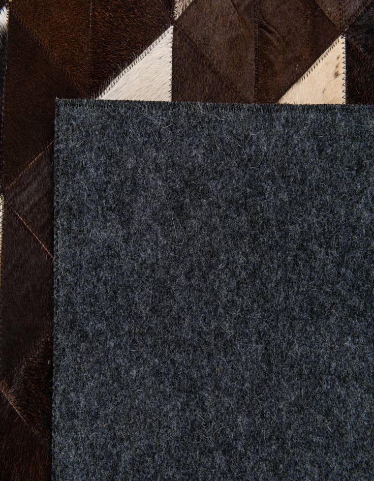 Detail image of  5' x 8' Cowhide Stocks Rug