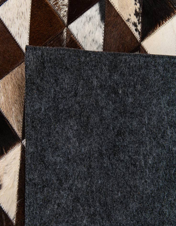 Detail image of  5' x 8' Cowhide Stocks Rug