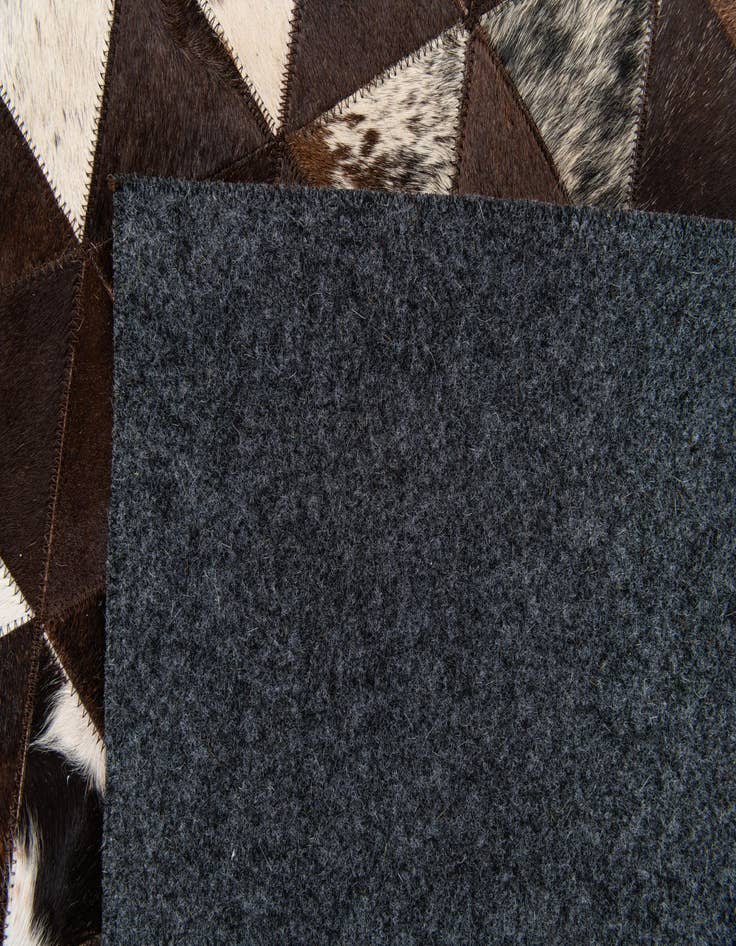 Detail image of  5' x 8' Cowhide Stocks Rug