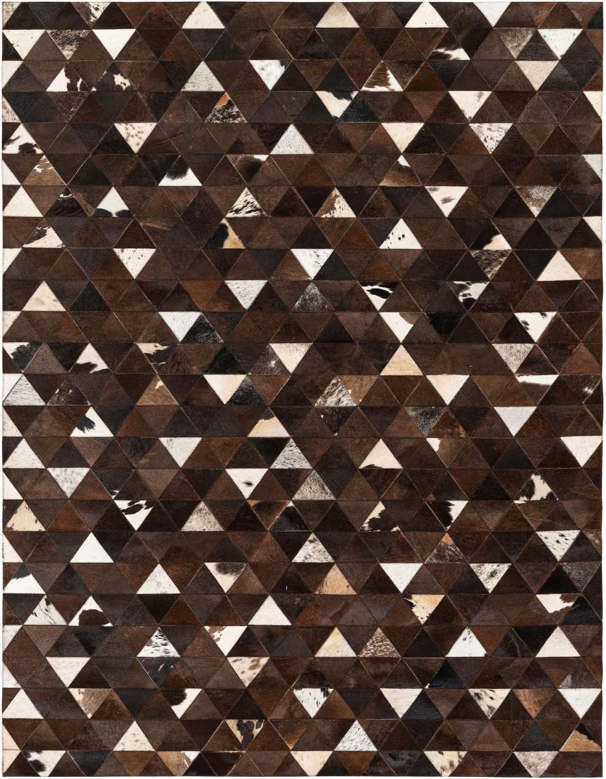 A 5x8 rectangular cowhide rug featuring a modern geometric pattern of dark brown, tan, and white triangular patches.