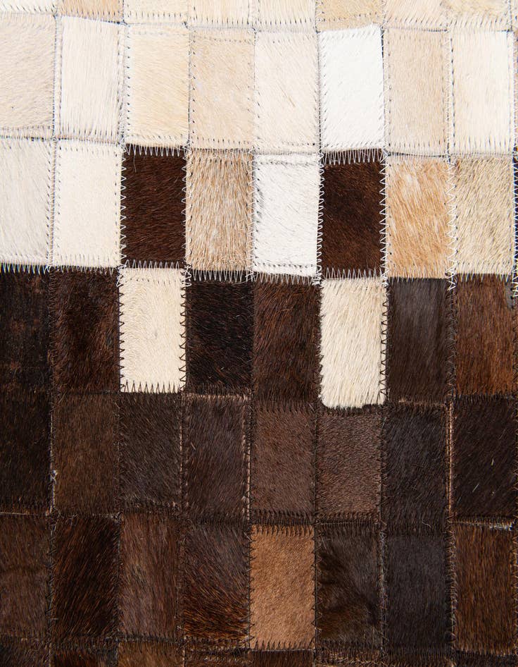 Detail image of  5' x 7' 11 Cowhide Stocks Rug