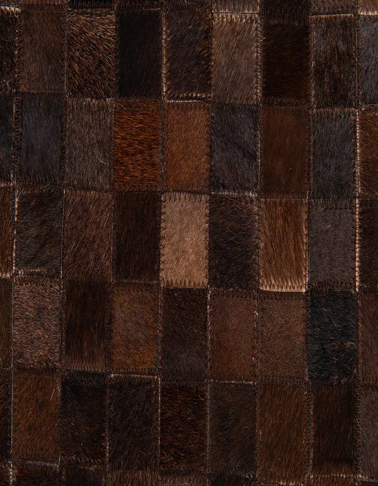 Detail image of  5' x 7' 11 Cowhide Stocks Rug
