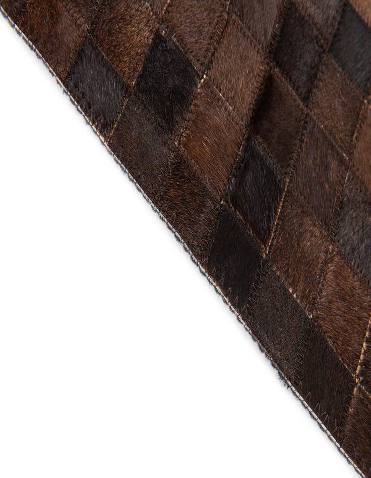 Detail image of  5' 1 x 7' 10 Cowhide Stocks Rug