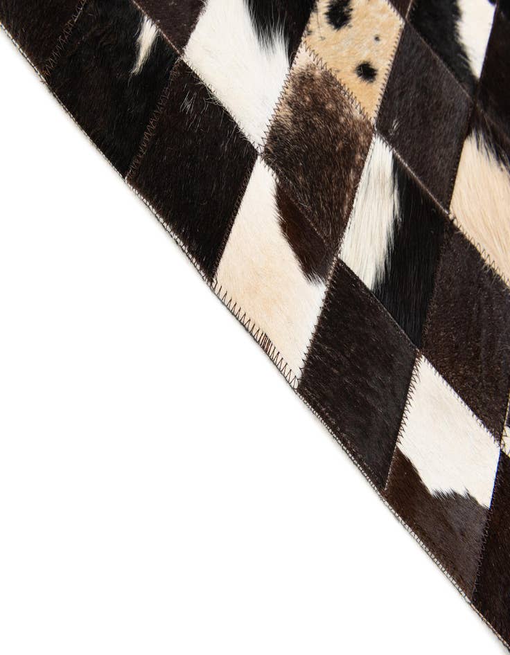 Detail image of  5' x 7' 11 Cowhide Stocks Rug
