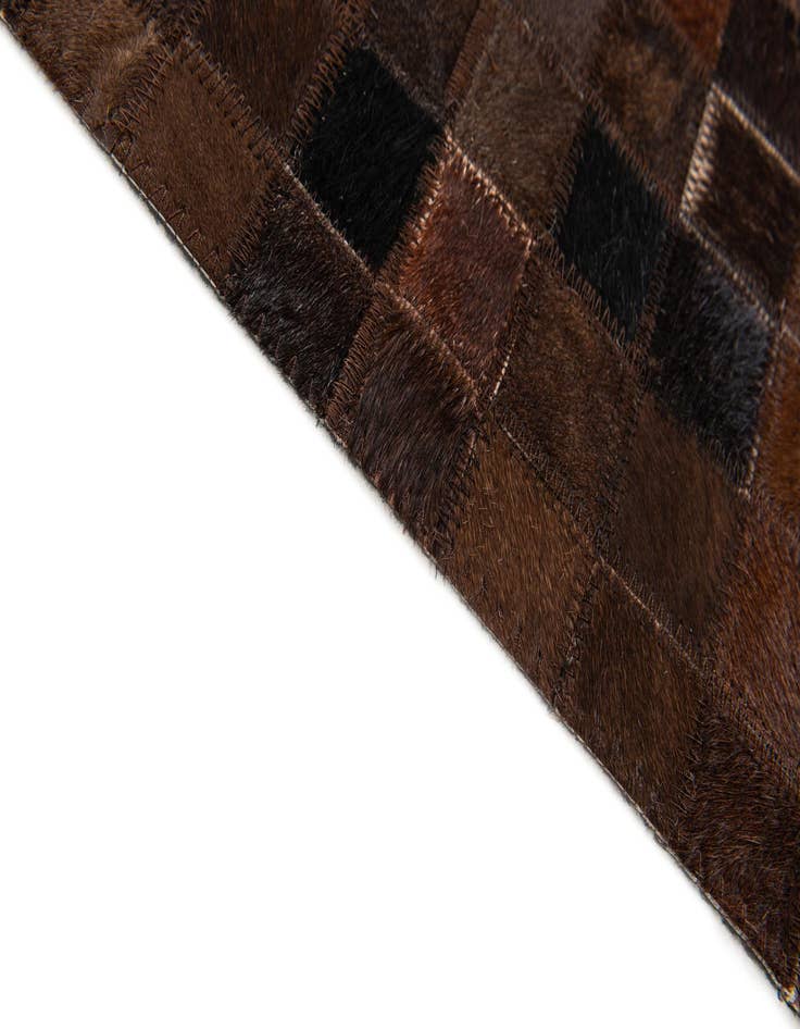 Detail image of  5' 1 x 8' Cowhide Stocks Rug