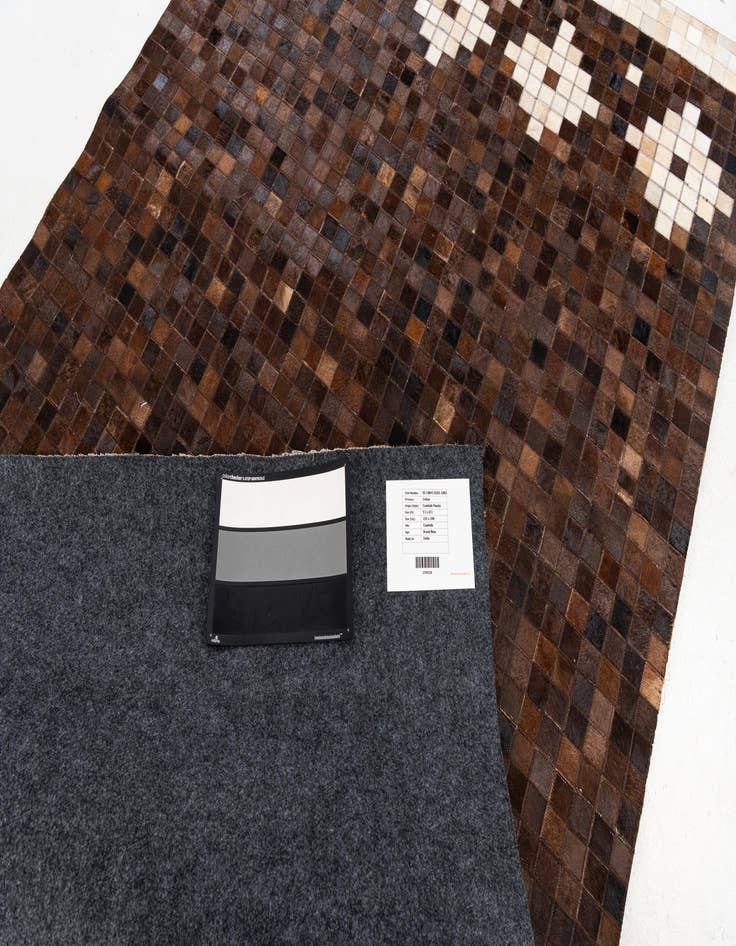 Detail image of  5' 1 x 8' 1 Cowhide Stocks Rug