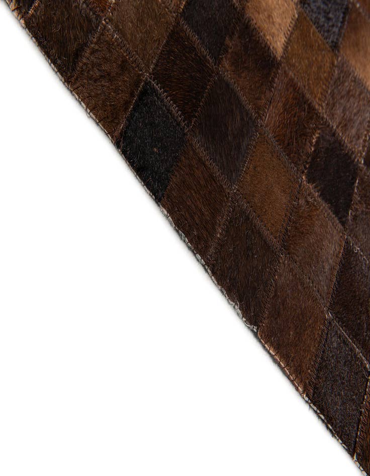 Detail image of  5' 1 x 8' 1 Cowhide Stocks Rug