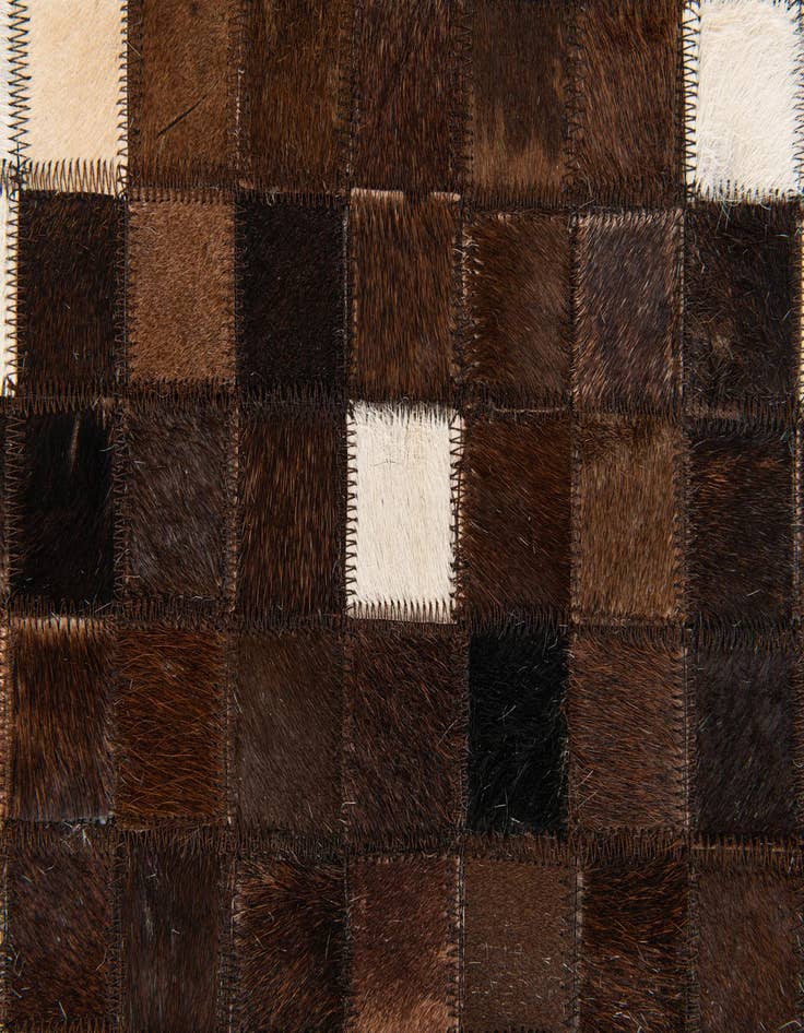 Detail image of  5' 1 x 8' Cowhide Stocks Rug
