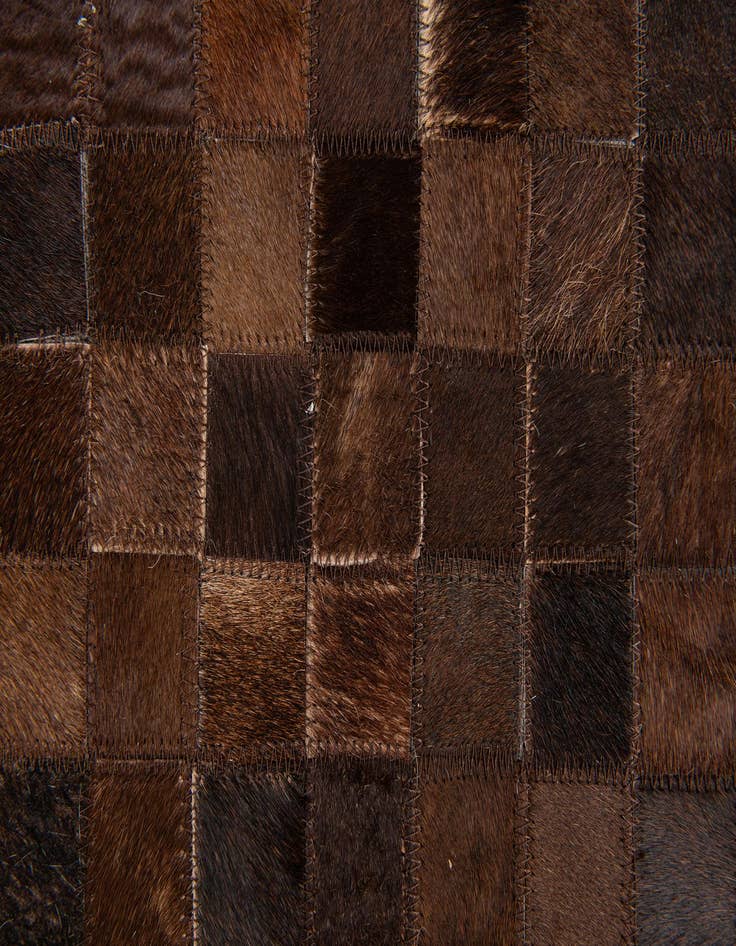 Detail image of  5' x 7' 11 Cowhide Stocks Rug