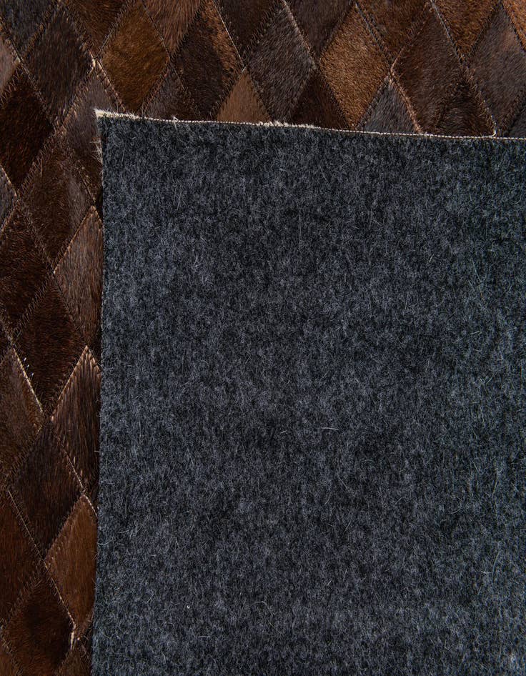 Detail image of  5' x 7' 11 Cowhide Stocks Rug