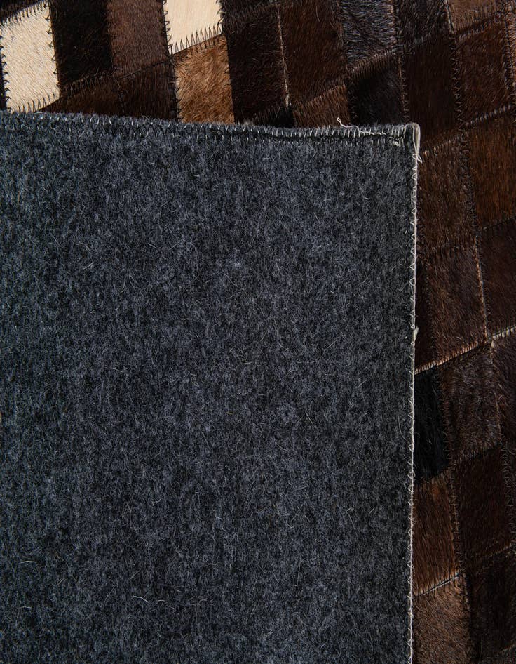 Detail image of  5' 2 x 7' 11 Cowhide Stocks Rug