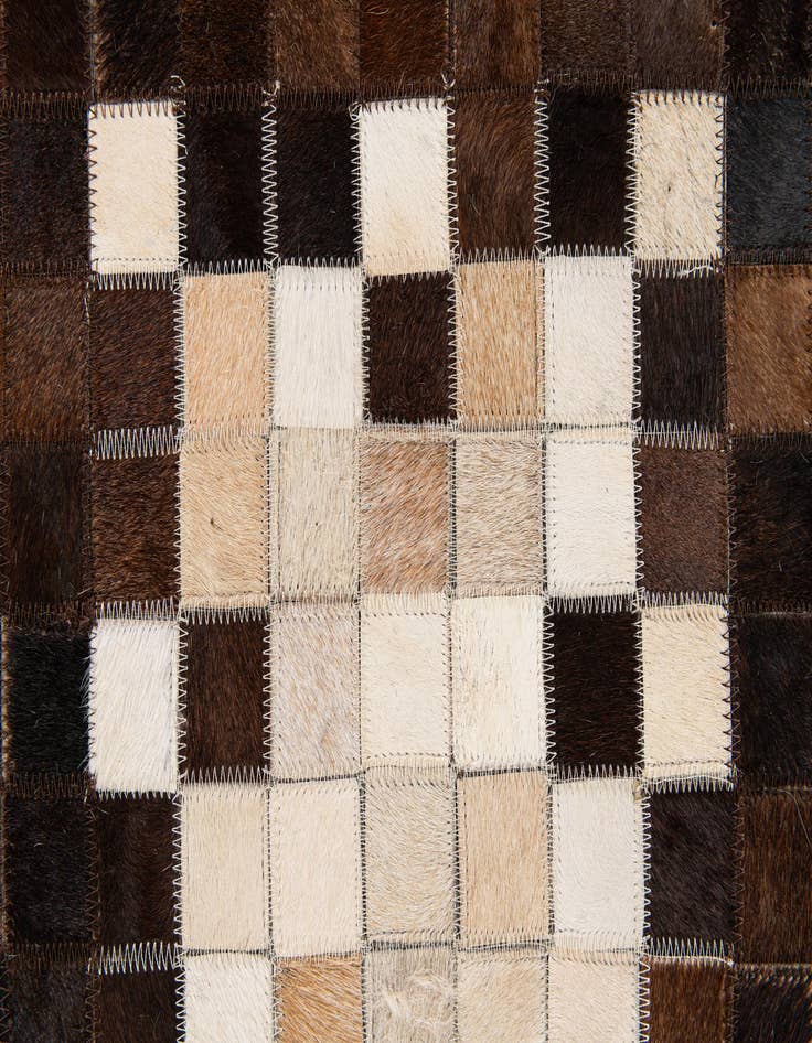 Detail image of  5' 2 x 7' 11 Cowhide Stocks Rug