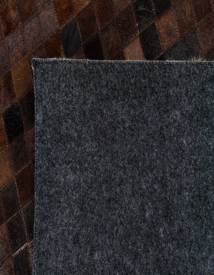 Detail image of  5' 2 x 7' 11 Cowhide Stocks Rug