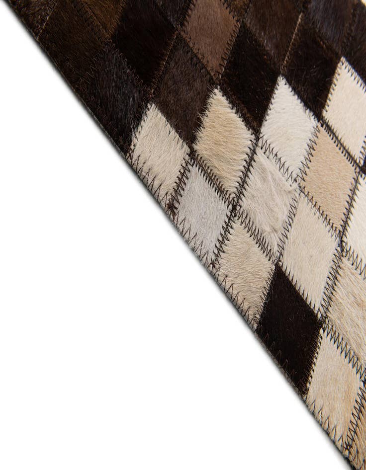Detail image of  5' 1 x 8' Cowhide Stocks Rug
