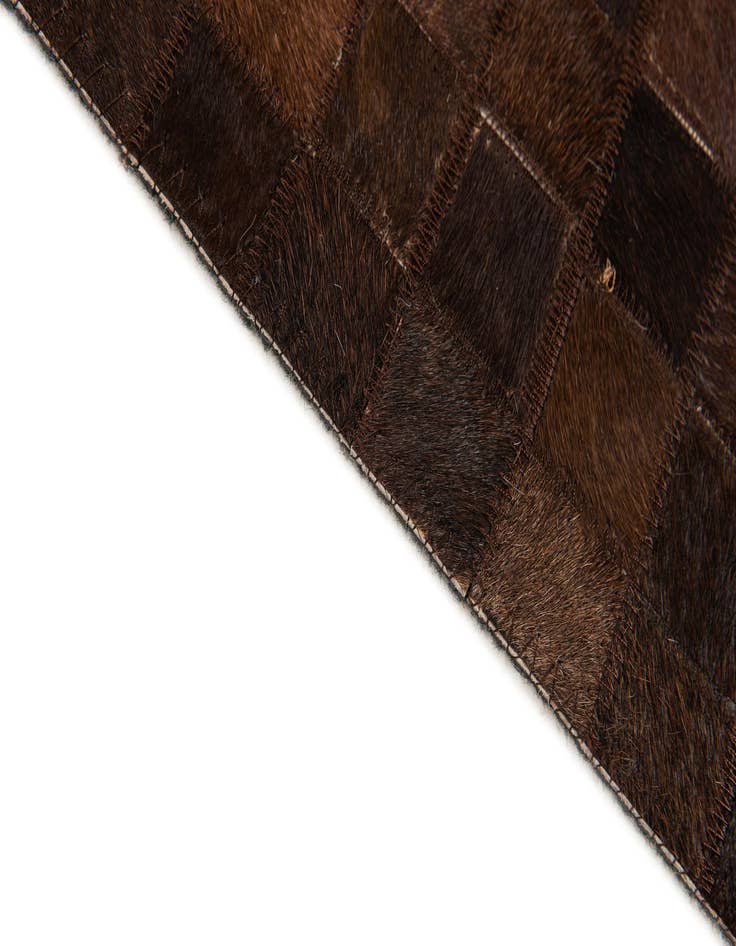 Detail image of  5' 2 x 8' Cowhide Stocks Rug