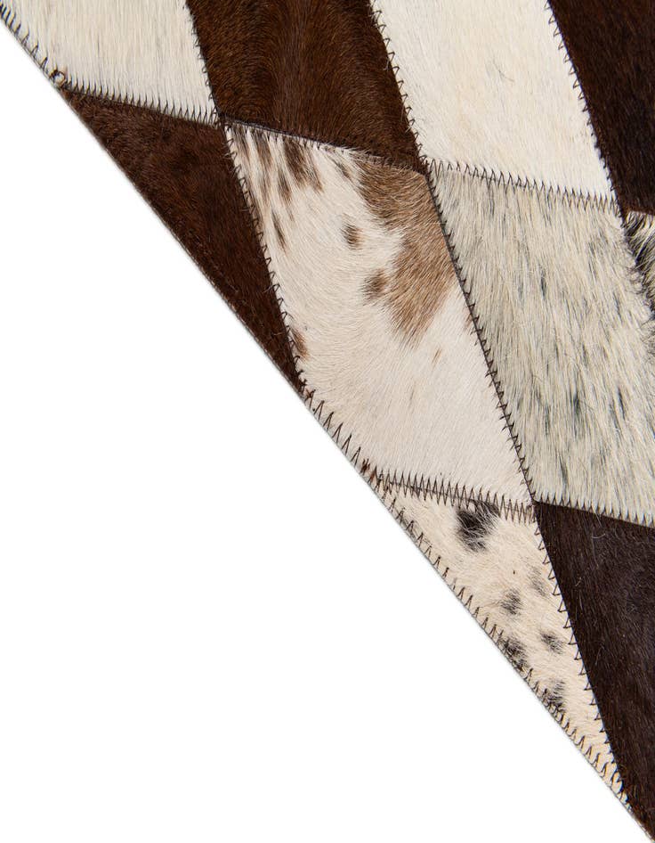 Detail image of  5' 8 x 7' 1 Cowhide Stocks Rug