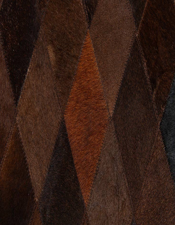 Detail image of  5' 1 x 8' Cowhide Stocks Rug