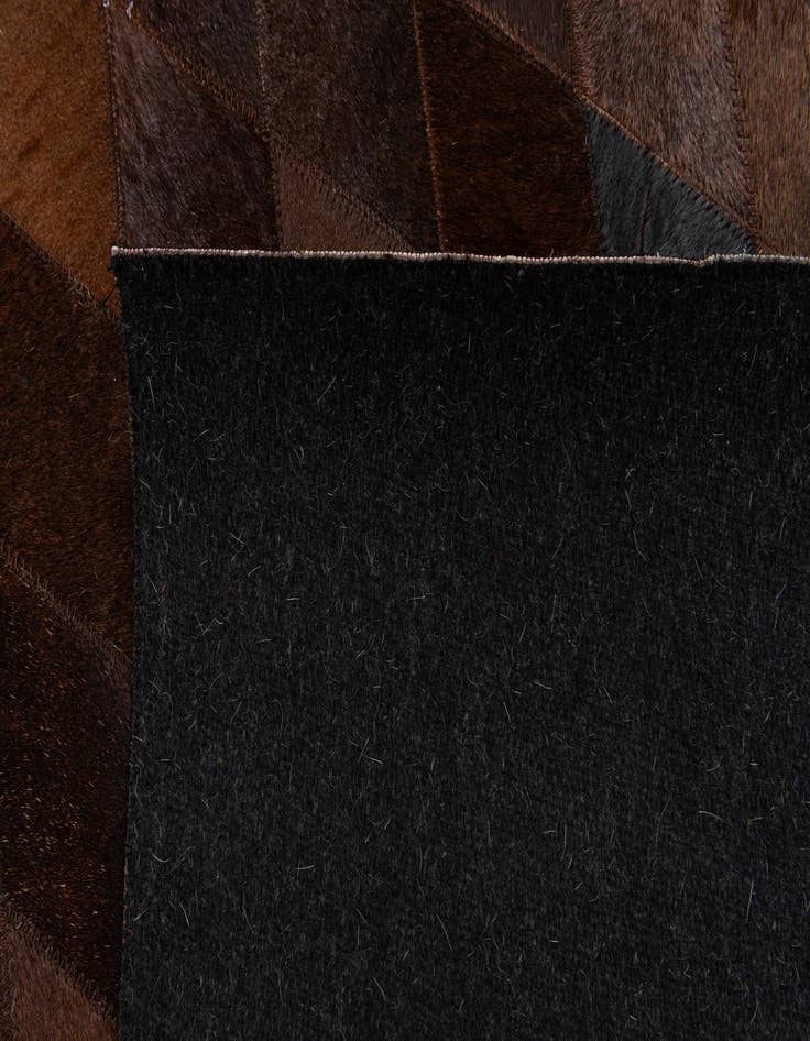 Detail image of  5' 1 x 8' Cowhide Stocks Rug