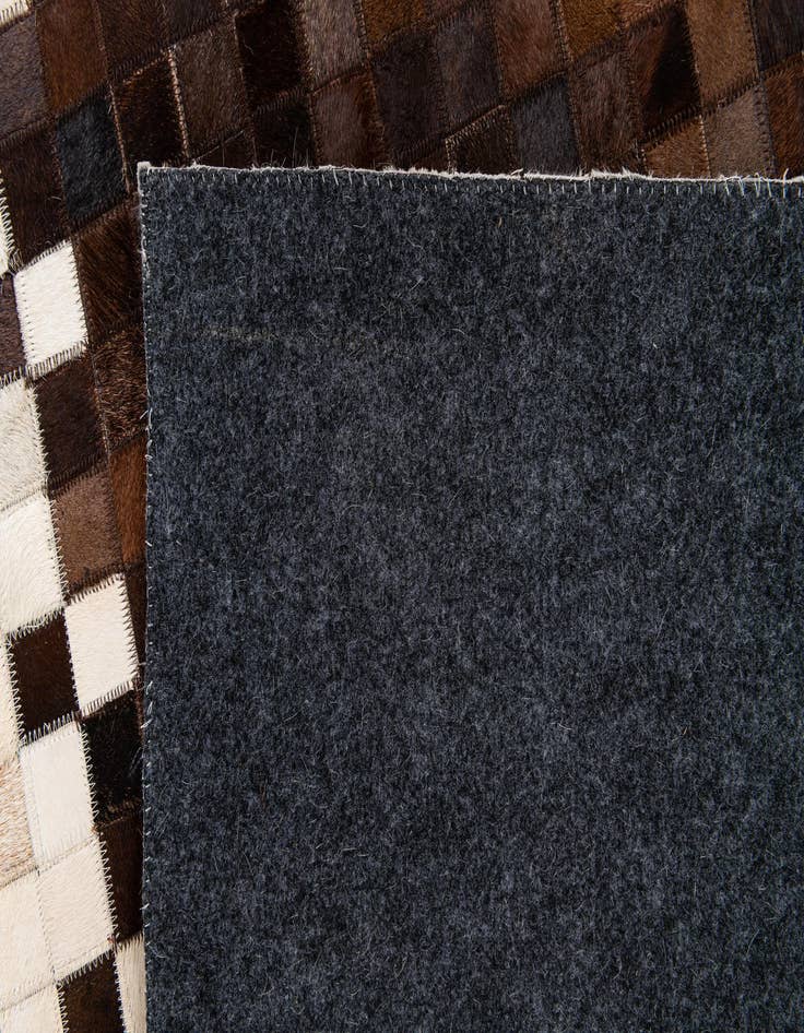 Detail image of  5' 2 x 7' 11 Cowhide Stocks Rug