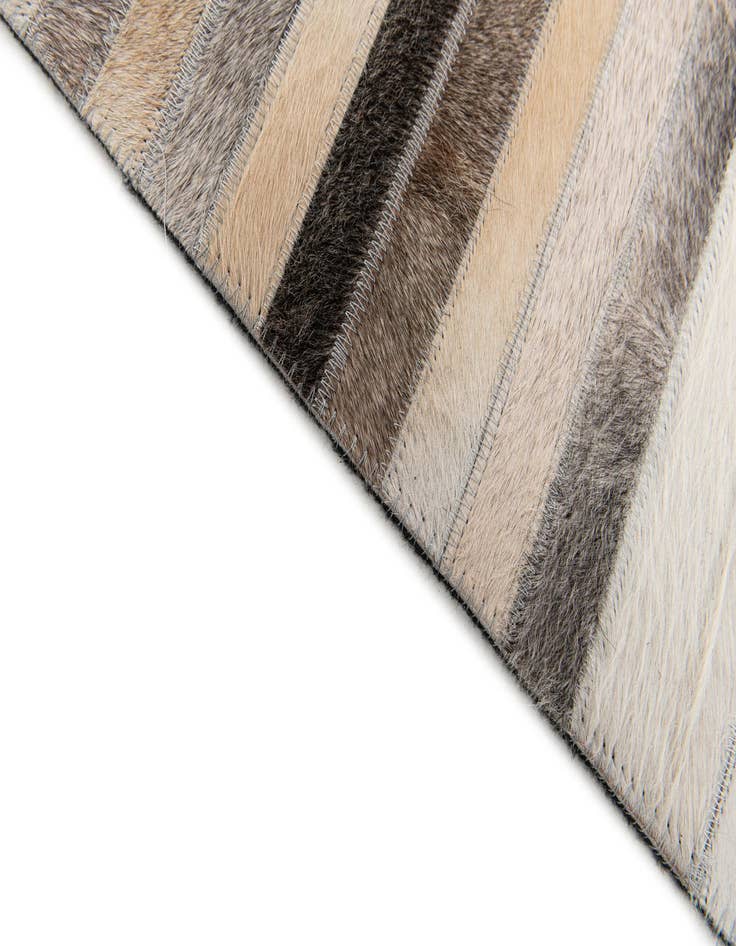 Detail image of  5' 1 x 8' Cowhide Stocks Rug