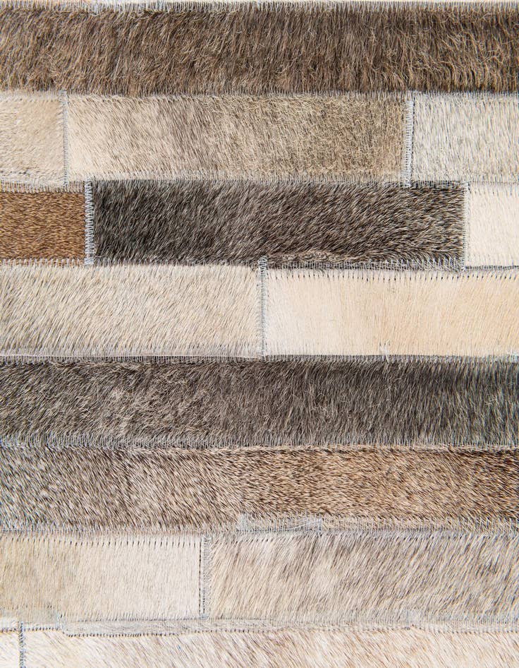 Detail image of  5' 1 x 8' Cowhide Stocks Rug