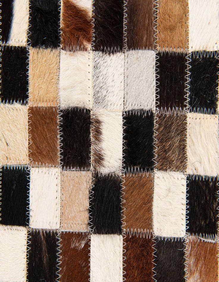Detail image of  5' 3 x 7' 6 Cowhide Stocks Rug