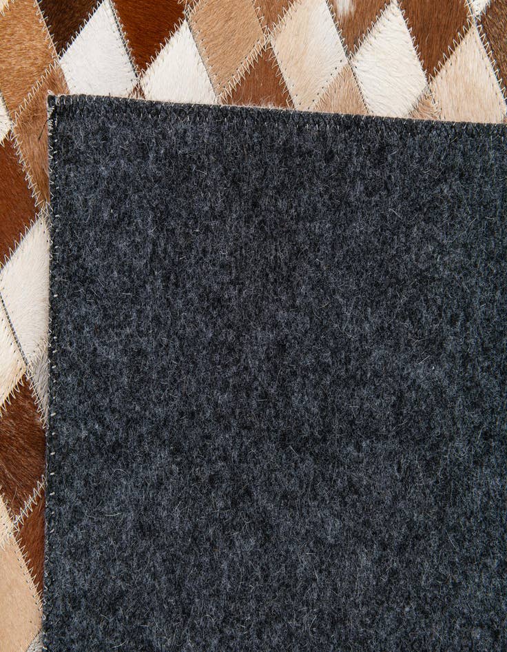 Detail image of  5' 1 x 7' 10 Cowhide Stocks Rug