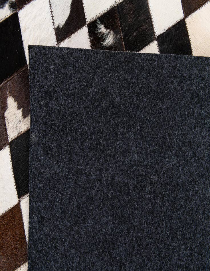 Detail image of  5' x 8' Cowhide Stocks Rug