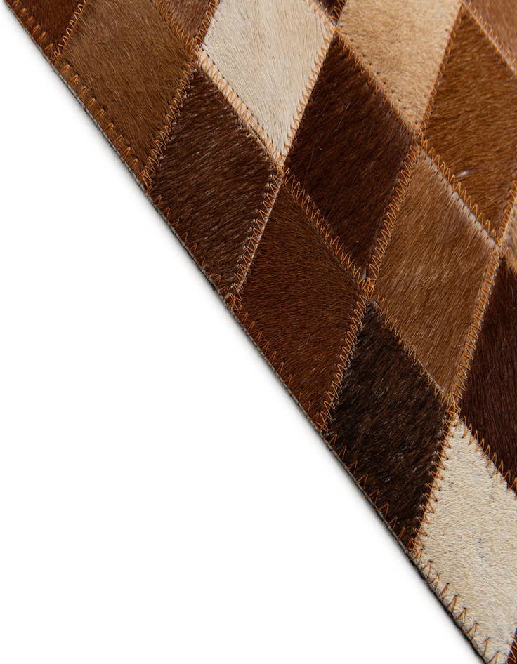 Detail image of  5' x 7' 11 Cowhide Stocks Rug