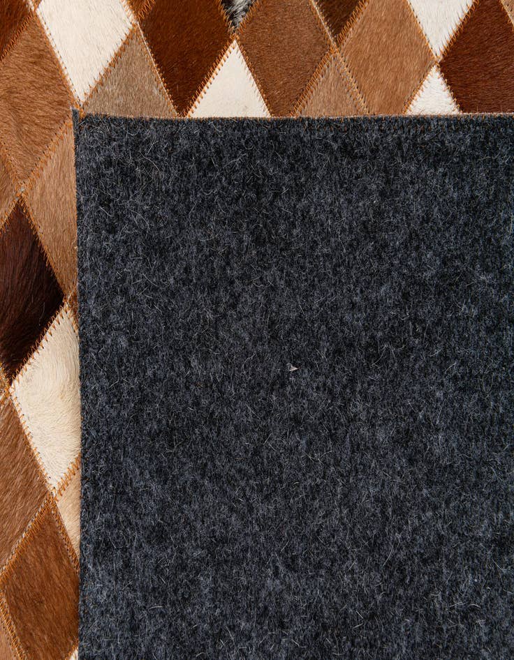 Detail image of  5' 1 x 7' 11 Cowhide Stocks Rug