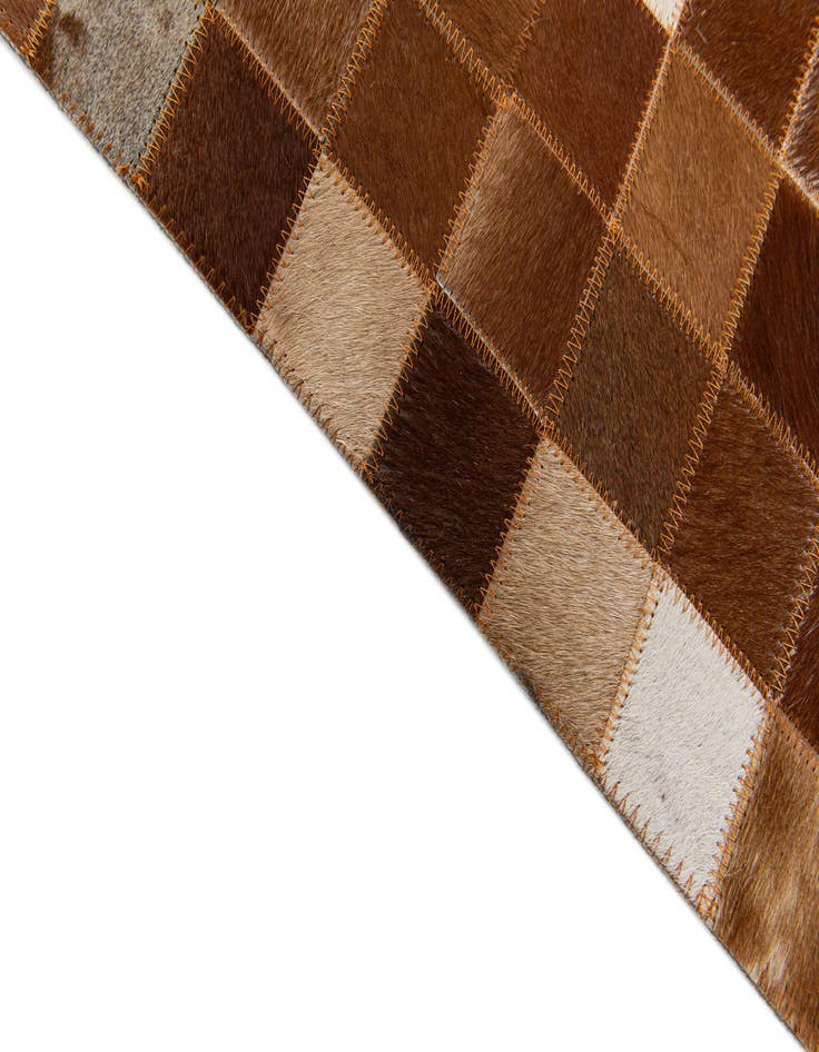 Detail image of  5' 1 x 7' 11 Cowhide Stocks Rug