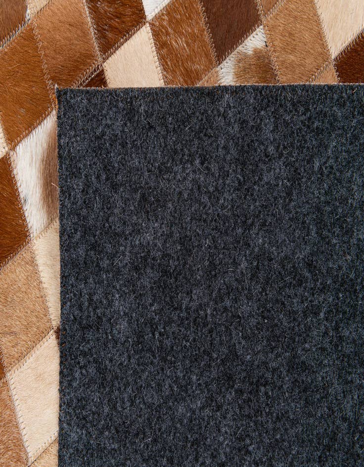 Detail image of  4' 10 x 7' 9 Cowhide Stocks Rug