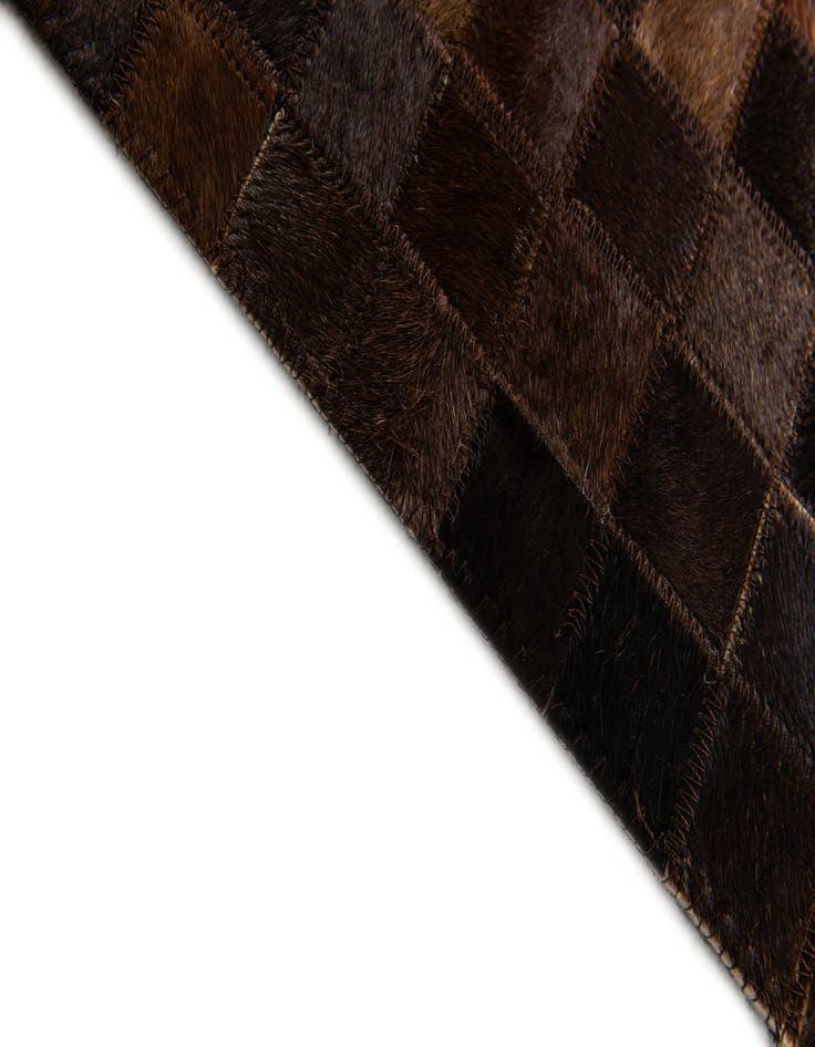 Detail image of  5' x 7' 11 Cowhide Stocks Rug