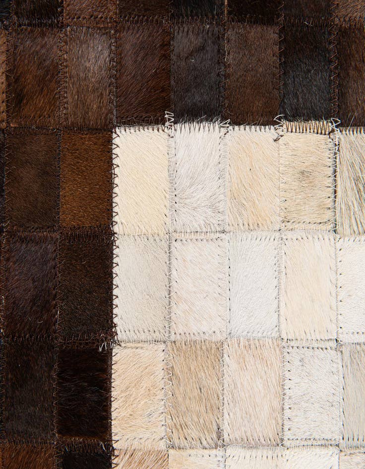 Detail image of  5' x 7' 11 Cowhide Stocks Rug