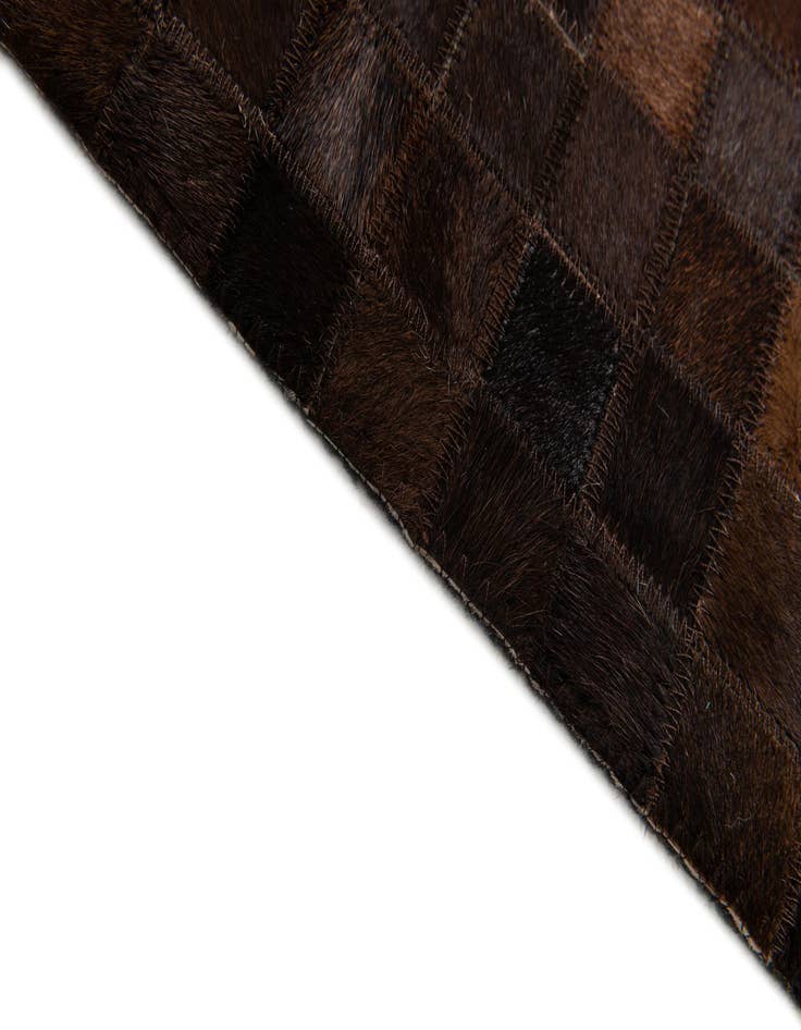 Detail image of  5' 2 x 8' 1 Cowhide Stocks Rug