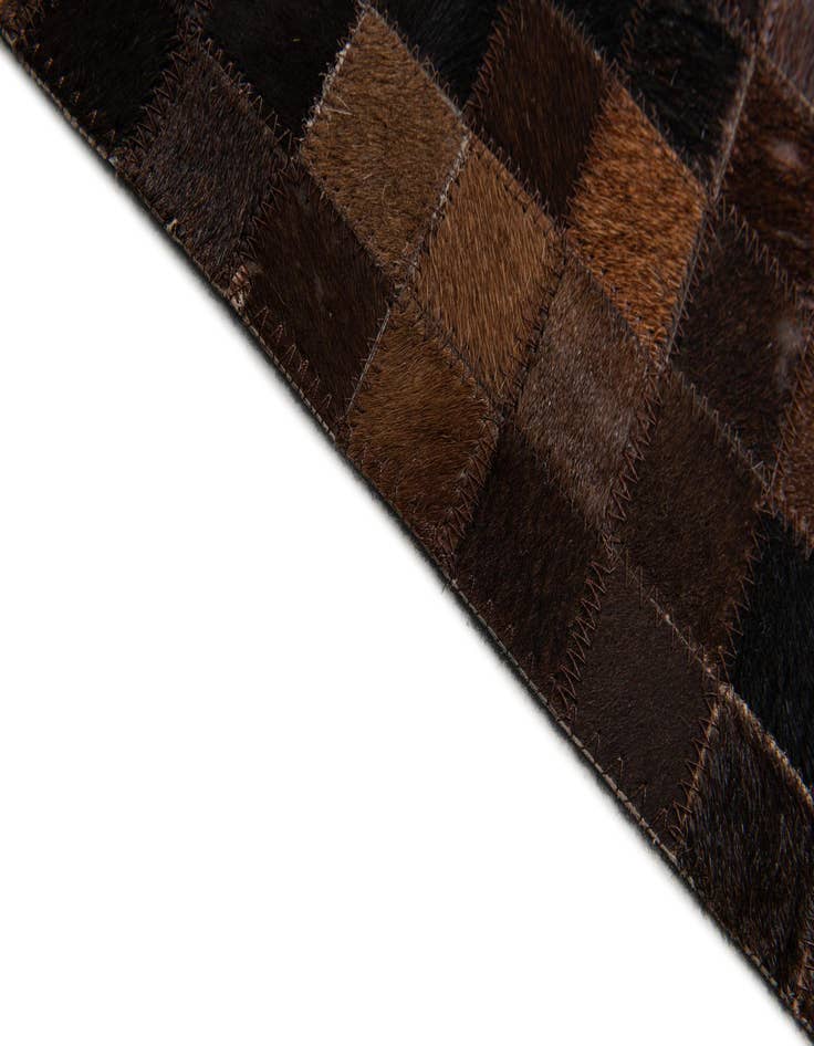 Detail image of  5' x 7' 11 Cowhide Stocks Rug