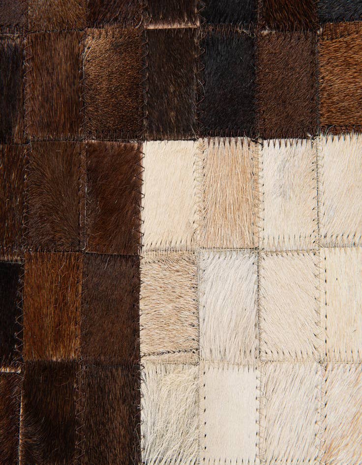 Detail image of  5' x 7' 11 Cowhide Stocks Rug