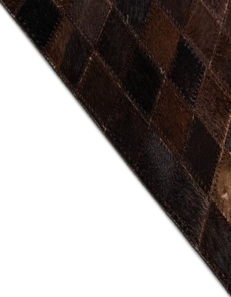 Detail image of  5' 1 x 7' 11 Cowhide Stocks Rug