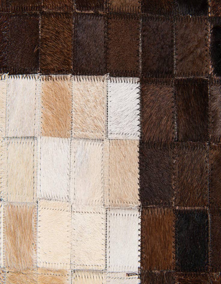 Detail image of  5' 1 x 8' Cowhide Stocks Rug