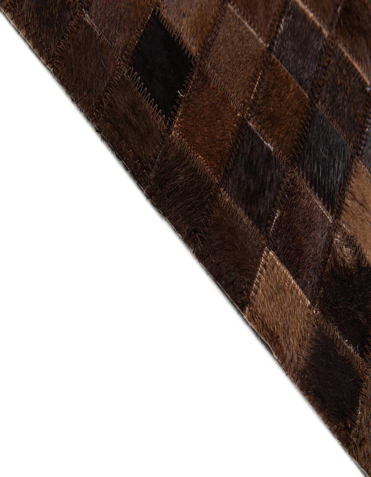 Detail image of  5' x 7' 10 Cowhide Stocks Rug