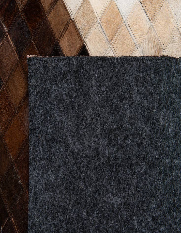 Detail image of  5' x 7' 10 Cowhide Stocks Rug